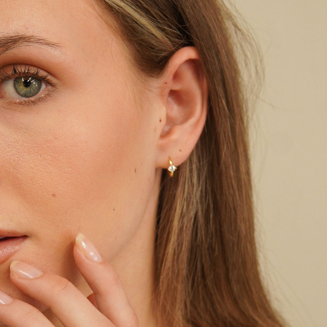 Aeris Gold Solitaire Huggie Earrings