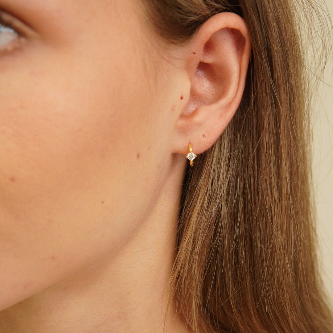 Aeris Gold Solitaire Huggie Earrings