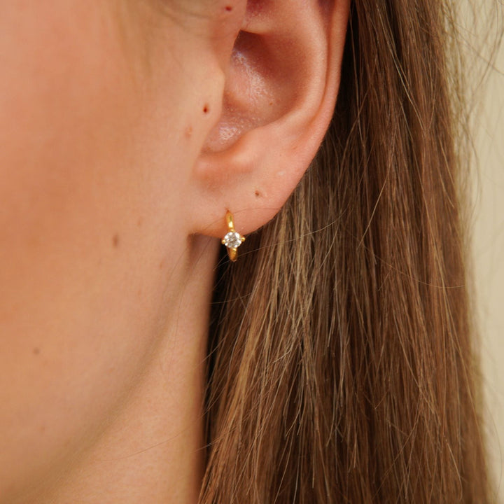 Aeris Gold Solitaire Huggie Earrings