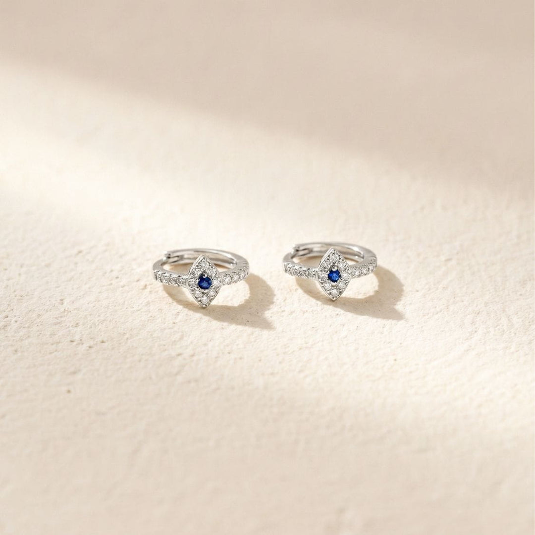 August Silver Evil Eye Huggie Earrings