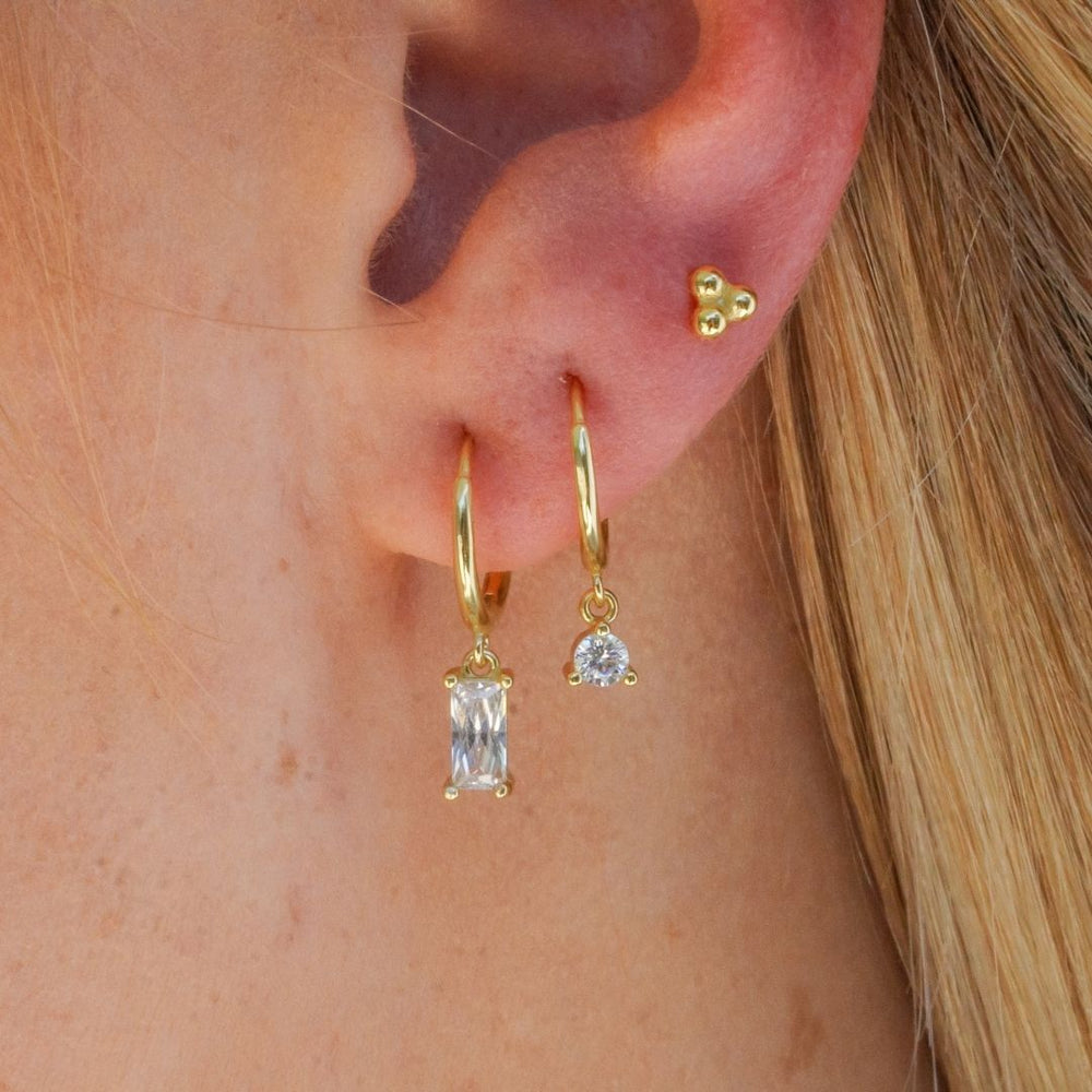 sparkly gold Earring Stack on model