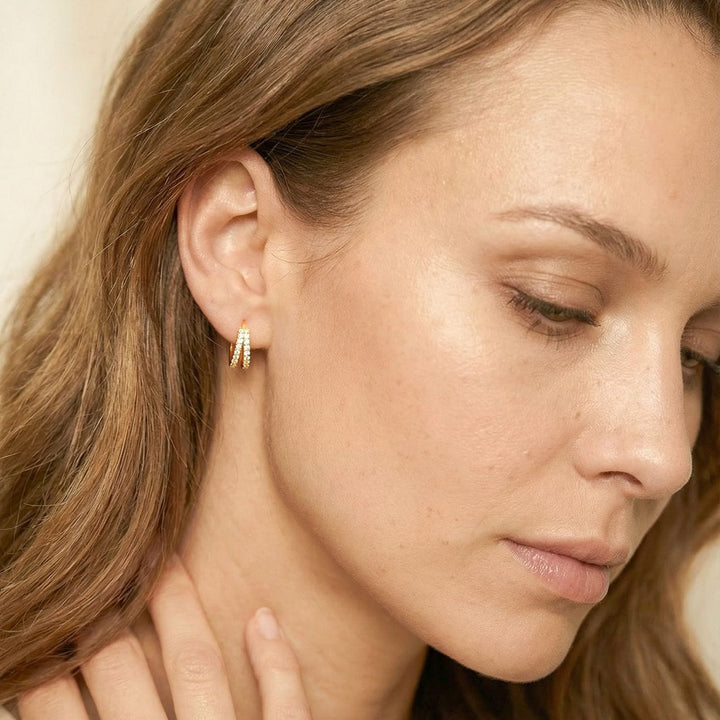 Kaylee Gold Double Pave Huggie Earrings on model
