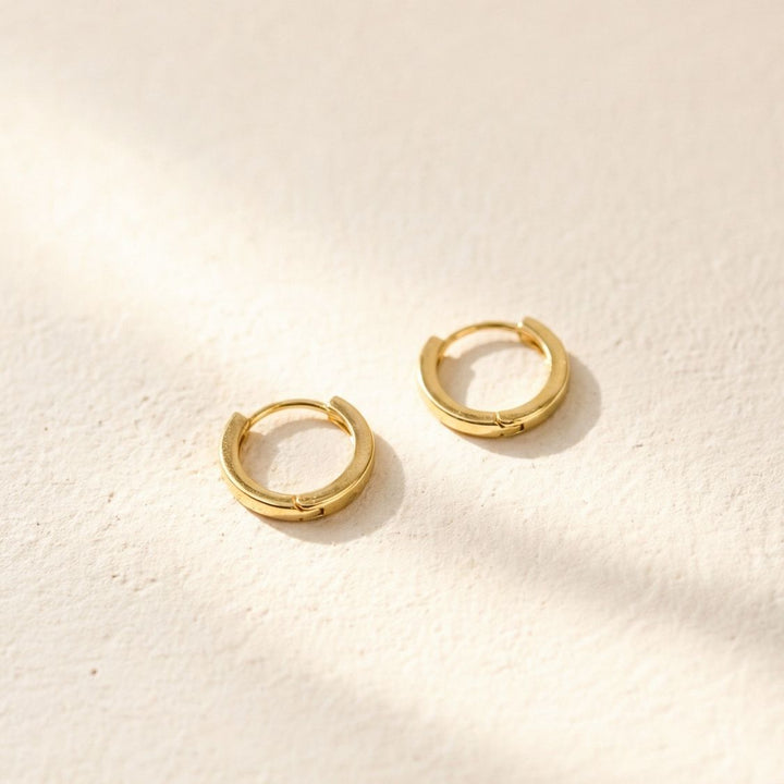 Leo Gold Huggie Earrings