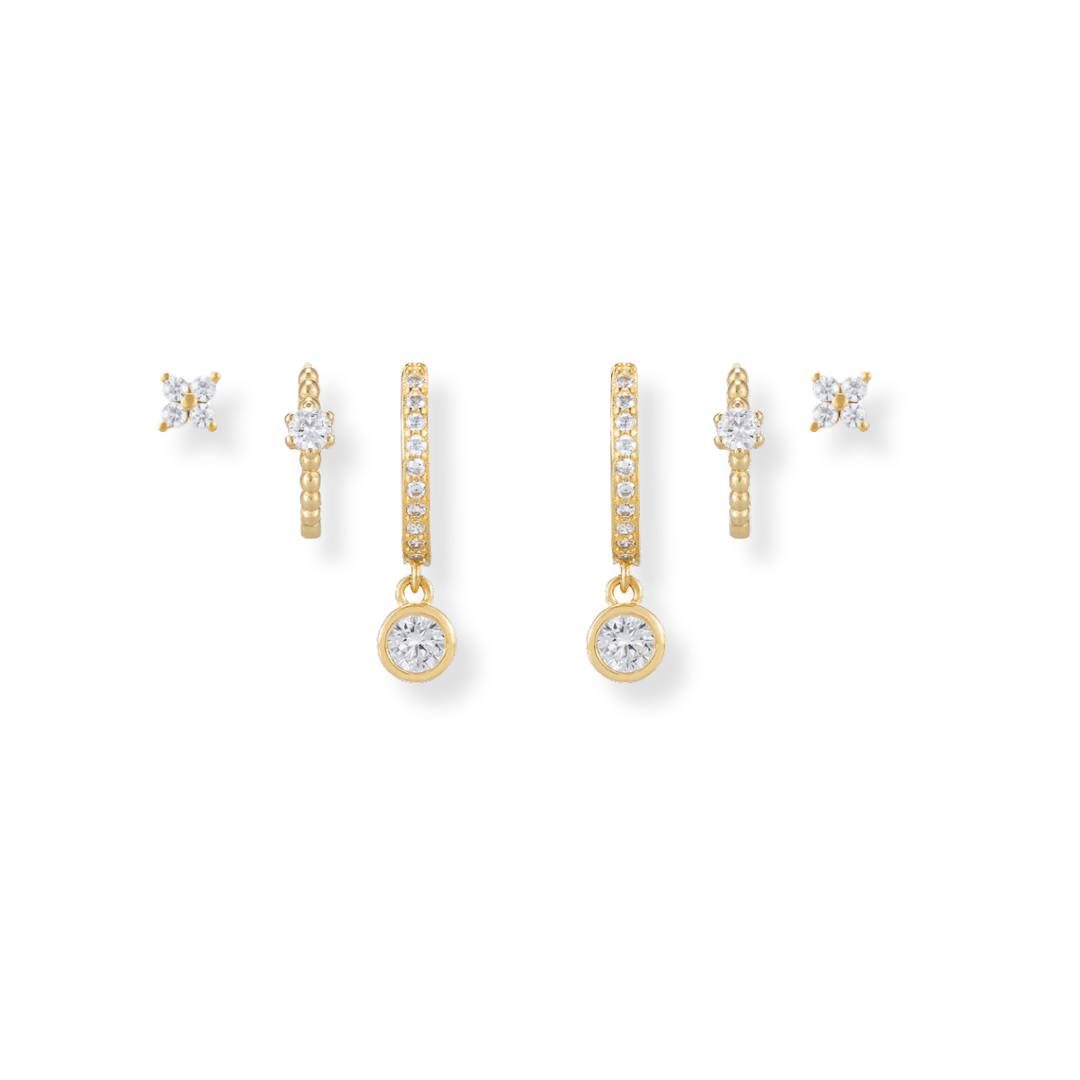 18k gold Sparkly Earring Stack featuring bazel drops, cz huggies and flower studs