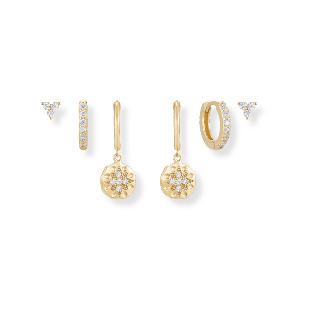 Gold earring stack – floral stud & CZ huggie & starburst drop