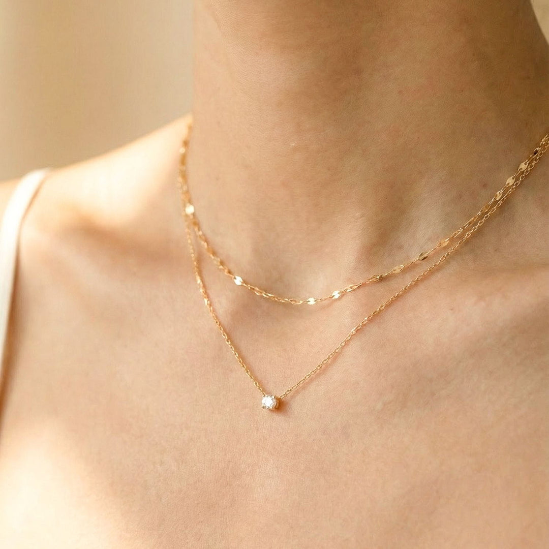 gold necklace stakcing