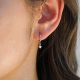 pearl huggie earrings silver