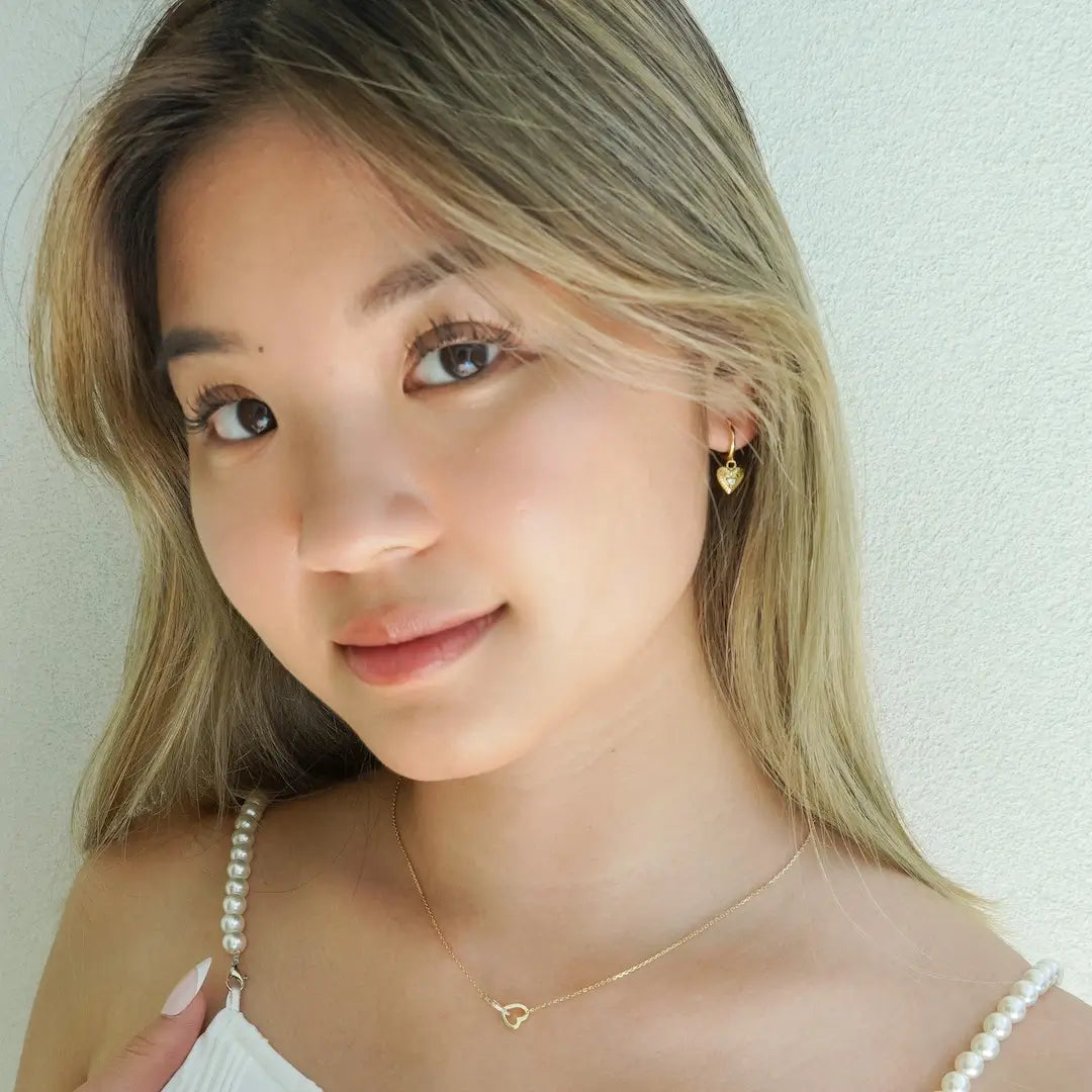 Heart Drop Huggie Earrings Gold on model