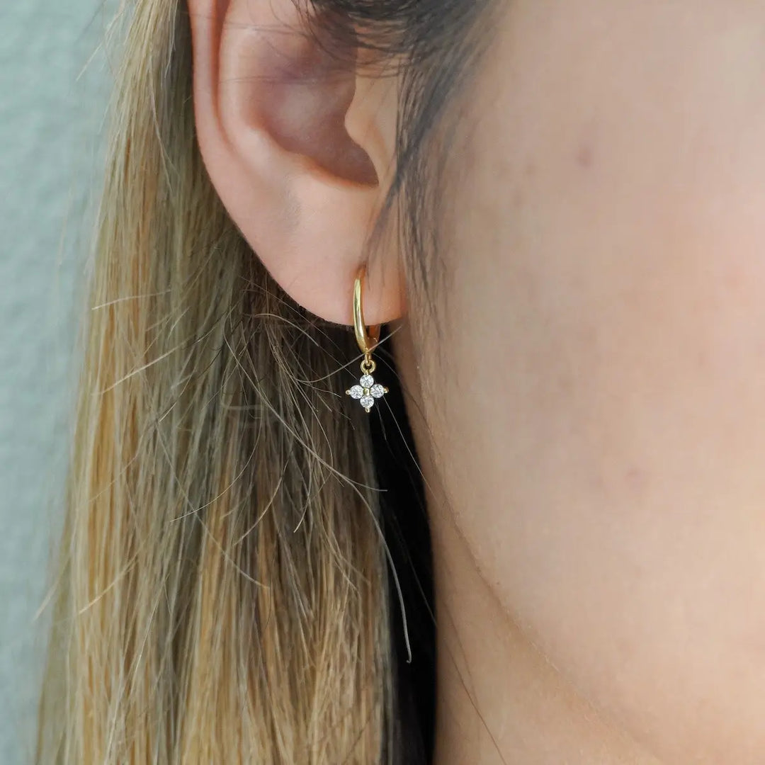 Flora Drop Huggie Earrings Gold on model