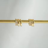 Pave Huggie Hoop Earrings Gold on display