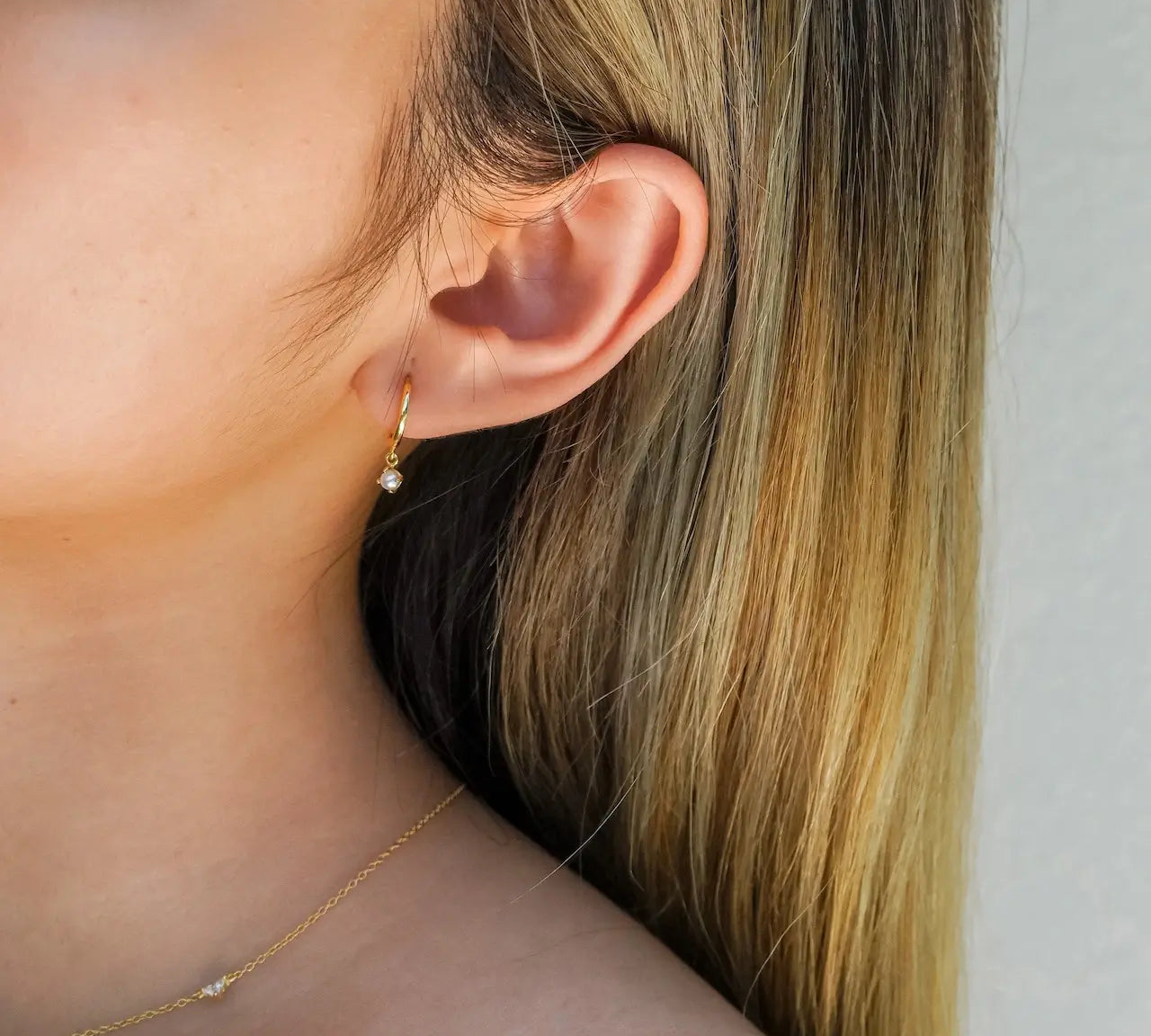  Dainty Pearl Huggie Earrings Gold